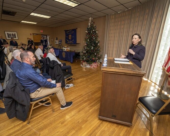 NJ Assemblywoman Aura Dunn addresses attendees at the Service Medal Ceremony 12 17 25