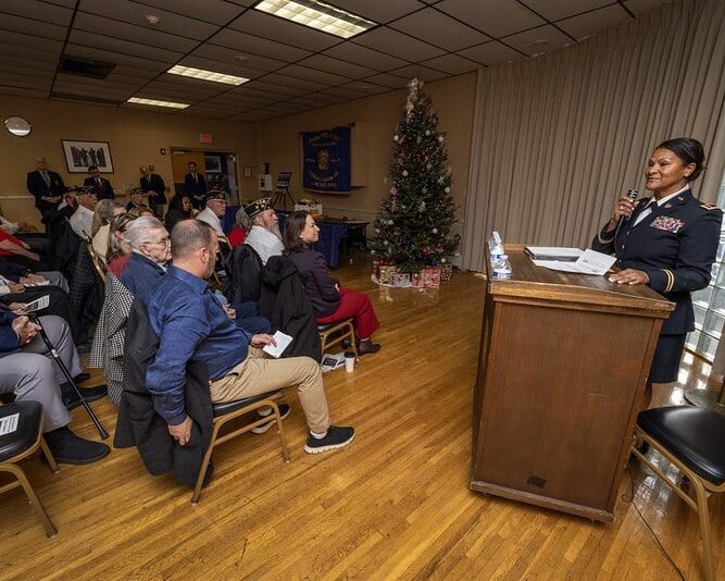 Retired Chief Warrant Officer Luisa Sanchez, Veterans Services, NJDMVA addresses the audience at the NJ Service Medal Ceremony 12 17 25.