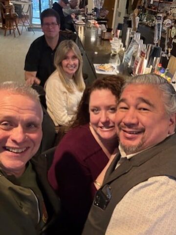 L to R front row: Stan Zon, Karyn Winaker and Jonathan Winaker reunite with other veteran Marines at the 35th anniversary of their activation and deployment during a Persian Gulf War, Operations Desert Storm/Shield.
